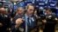 Traders work on the floor of the New York Stock Exchange shortly after the opening bell in New York, March 19, 2018. 