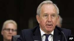 David Bagley, the head of compliance for London-based HSBC Holdings, reads an opening statement before a Senate investigative committee, "U.S. Vulnerabilities to Money Laundering, Drugs, and Terrorist Financing: HSBC Case History," on Capitol Hill in Wash