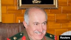 An undated handout photograph distributed by Syria's national news agency SANA shows General Jama'a, a top-ranking general, who was killed in Deir al-Zor city on October 17, 2013, in northeastern Syria. 
