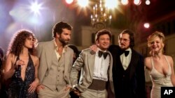 This film image released by Sony Pictures shows, from left, Amy Adams, Bradley Cooper, Jeremy Renner, Christian Bale and Jennifer Lawrence in a scene from "American Hustle." The film was nominated for an Academy Award for best picture on Thursday, Jan. 1
