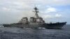 Un navire américain tire des coups de semonce contre des bateaux iraniens