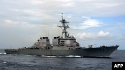 FILE - A picture downloaded from the US Navy website shows the guided-missile destroyer USS Mahan (DDG 72) steaming in the Atlantic Ocean during a training exercise, July 18, 2007.