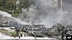 Des dizaines de voitures détruites dans l'attentat du 16 juin à Abuja