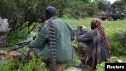 Soldiers from Somalia's Puntland keep guard on high grounds at the Galgala hills, during preparations for an offense against al-Shabaab militants, north of the capital Mogadishu, Jan. 9, 2015. 