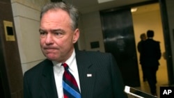 FILE - Sen. Tim Kaine, D-Va., referring to proposals to screen for those who should be prevented from owning guns, says that "the better the background record check system, the safer people are."