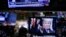 Una imagen del presidente Donald Trump se muestra en una computadora de la Bolsa de Valores de Nueva York, el lunes 24 de diciembre de 2018.