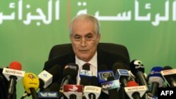 Algerian Interior Minister Tayeb Belaiz announces the results of the presidential election during a press conference in Algiers, April 18, 2014. 