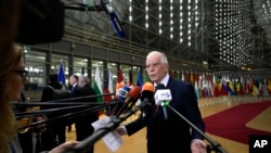 FILE — European Union foreign policy chief Josep Borrell speaks with the media as he arrives for a meeting of EU foreign ministers at the European Council building in Brussels, Jan. 22, 2024.