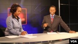 VOA In Focus hosts Ndimyake Mwakalyelye and Vincent Makori (right) get ready for their show. In Focus is a 30-minute magazine program that brings information about Africa, the United States, and the world to viewers across Africa.