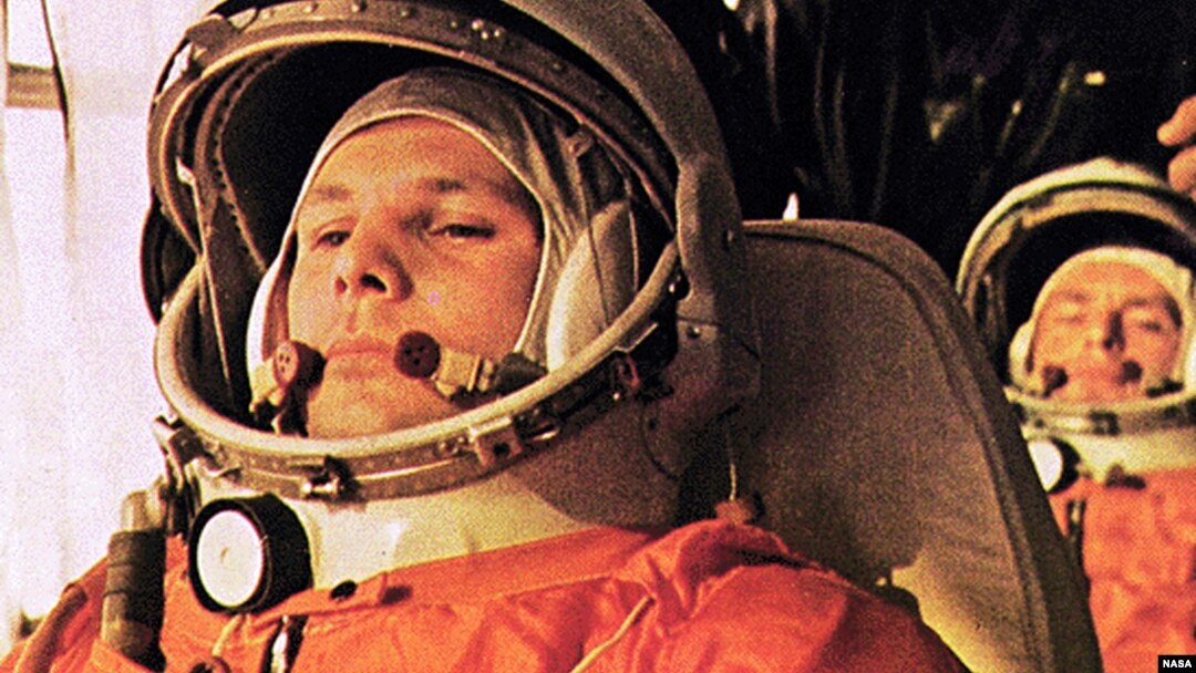 FILE - Soviet cosmonaut Yuri Gagarin, pilot of the Vostok 1, is on the bus on the way to the launch.