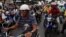 Motorcyclists attend a rally in support of Venezuela's President Nicolas Maduro in Caracas, Venezuela, Feb. 24, 2014. 