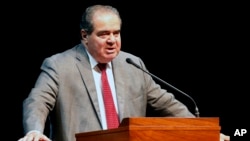 FILE - Supreme Court Justice Antonin Scalia speaks at the University of Minnesota in Minneapolis.