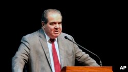 FILE - Supreme Court Justice Antonin Scalia speaks at the University of Minnesota in Minneapolis.