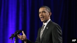 President Barack Obama speaks during a campaign event in Washington, Decemver 13, 2011.