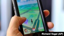 FILE - Pokemon Go is displayed on a cell phone in Los Angeles, California, July 8, 2016.