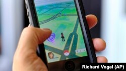 Pokemon Go is displayed on a cell phone in Los Angeles on Friday, July 8, 2016.