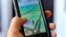 FILE - Pokemon Go is displayed on a cell phone in Los Angeles, California, July 8, 2016.