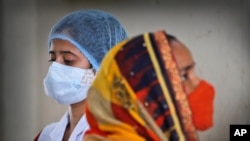 A health worker prepares to administer the vaccine for COVID-19 in New Delhi, India, July 2, 2021. 