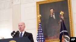 President Joe Biden speaks during an event in the State Dining Room of the White House in Washington, June 23, 2021, discussing his administration's gun crime prevention strategy.