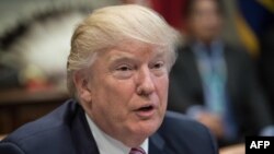 President Donald Trump speaks during a tribal, state, and local energy roundtable in the Roosevelt Room at the White House in Washington, June 28, 2017. 