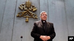 Cardinal George Pell arrives to make a statement, at the Vatican, June 29, 2017. The Catholic Archdiocese of Sydney says Vatican Cardinal George Pell will return to Australia to fight sexual assault charges.