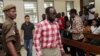 Tanzanian investigative journalist Erick Kabendera arrives at the Kisutu Residents Magistrate Court in Dar es Salaam, Tanzania, Aug. 19, 2019. 