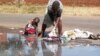 Mujuru, Chombo Urge MDC Ministers to Scrap Residents' Debts