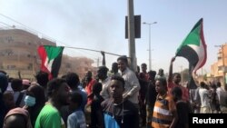 Protesters gather during what the information ministry calls a military coup in Khartoum, Sudan, Oct. 25, 2021.