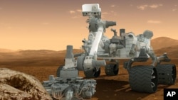 FILE - An artist's rendeing of the Curiosity rover on the surface of Mars.