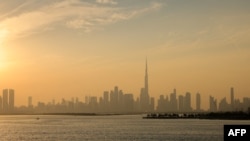 FILE - Haze obscures the Dubai skyline including Burj Khalifa, the world’s tallest building on December 4, 2023. The UAE is choking under "alarmingly high" air pollution levels fed by its fossil fuel industry, Human Rights Watch warned on December 4.