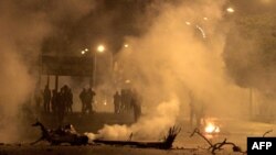 Demonstrators clash with security forces during a protest in the Tunisian city of Siliana, the capital of the governorate of the same name, about 130 kms southwest of Tunis, Jan. 16, 2021. (AFP photo/Feouzi Dridi) 