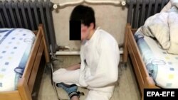 BOSNIA-HERZEGOVINA - An undated handout picture anonymously made available to and distributed by Bosnian opposition lawmaker Sabina Cudic shows a child tied to a radiator in a public care home for mentally challenged children in Bosnia and Herzegovina (is