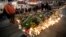 Candles and flowers placed in central Stockholm to commemorate the victims of last Friday's terror attack in the city, in Stockholm, Sweden, April 9, 2017. 