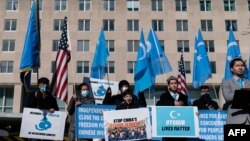 Uyghurs of the East Turkistan National Awakening Movement hold a rally outside the US State Department calling on US President Joe Biden to increase pressure on the Chinese Communist Party, on Feb. 5, 2021 in Washington.