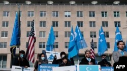 Uyghurs of the East Turkistan National Awakening Movement hold a rally outside the State Department calling on President Joe Biden to increase pressure on the Chinese Communist Party, on Feb. 5, 2021 in Washington.