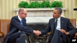 Presiden AS Barack Obama menerima kunjungan PM interim Ukraina Arseniy Yatsenyuk di Gedung Putih Rabu (12/3). 