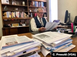 C. David Shepherd reviews documents in his Las Vegas office. Shepherd owns the Readiness Resource Group and was head of security of the Venetian Hotel and Casino for nearly eight years.