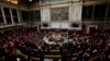 Parliament members attend a session of questions to the Government at the French National Assembly in Paris, France, Jan. 4, 2022. 