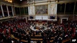 Parliament members attend a session of questions to the Government at the French National Assembly in Paris, France, Jan. 4, 2022. 