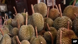 FILE - This Sept. 3, 2019, file photo shows durians for sale in Bangkok. 