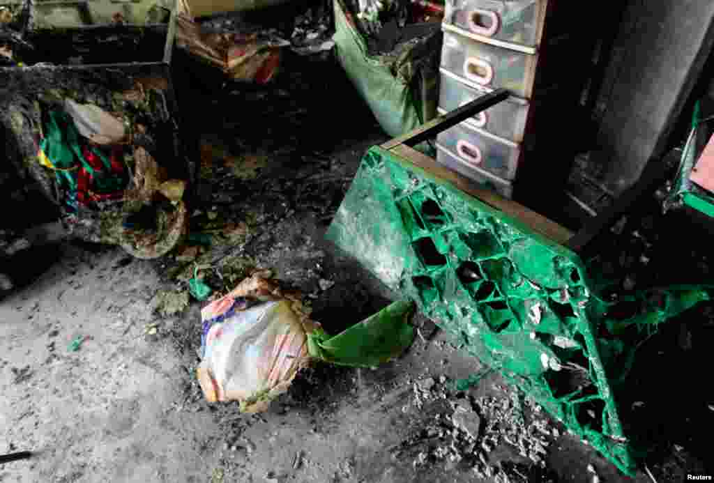 A burnt desk in a classroom near the site of the explosion, May 7, 2013