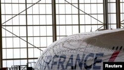 Archivo - Air France y KLM piensan reanudar vuelos a China para mediados de marzo.
