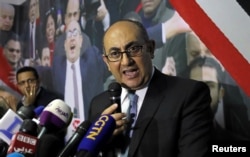 Egyptian lawyer and ex-presidential candidate Khaled Ali speaks during a news conference in Cairo, Egypt, Nov. 6, 2017.