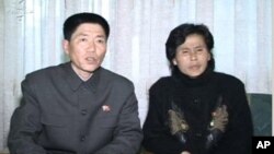 This undated video grab posted on March 9, 2011 by North Korea's official website Uriminzokkiri.com shows Bong Yon-Chol (L) and Ri Jong-Hwa (R), the parents of would-be defector Bong Un-Ha. North Korea stepped on a propaganda campaign to secure the retur