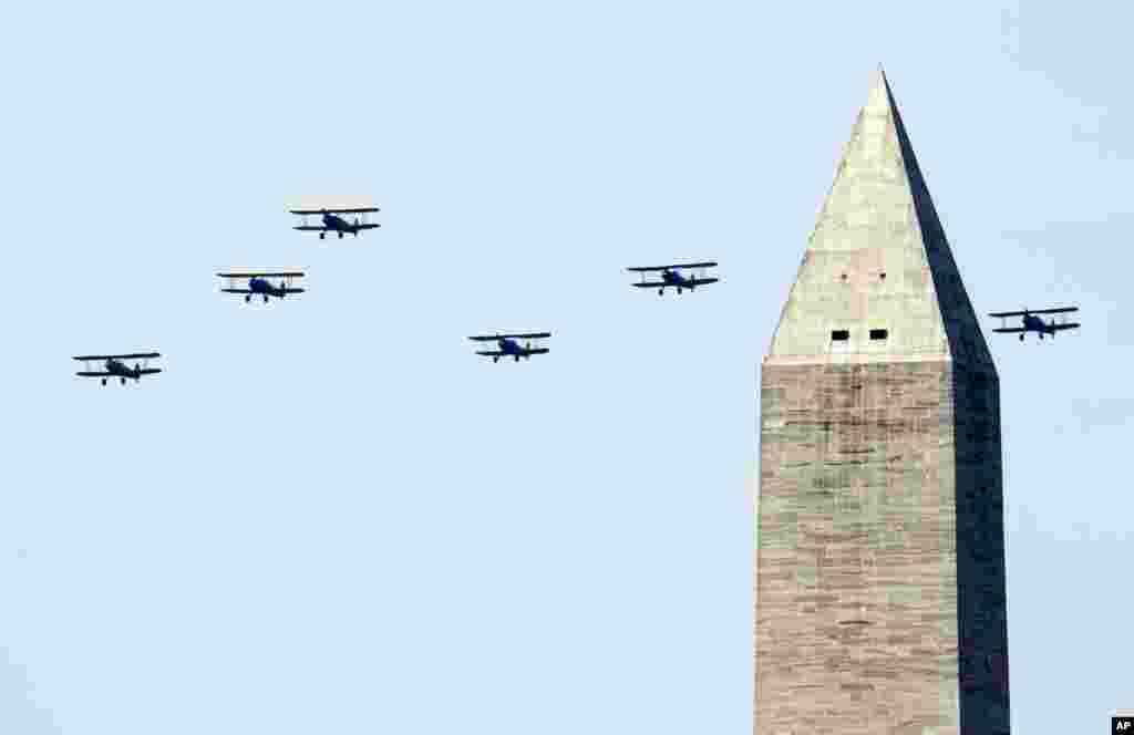 World War II vintage aircraft flyover near the Washington Monument in Washington, D.C., May 8, 2015, marking the 70th anniversary of the end of the war in Europe, and to commemorate the Allied victory in Europe during World War II. 