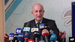 FILE— Algeria's President Abdelmajid Tebboune gives a press conference, in Algiers, Algeria, March 24, 2019. 