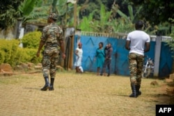 FILE - Soldiers patrol in Bafut, in the northwest English-speaking region of Cameroon, Nov. 15, 2017.