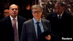 Businessman Bill Gates exits through the lobby at Trump Tower in Manhattan, New York City, Dec. 13, 2016. 