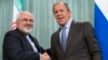 FILE - Iranian Foreign Minister Mohammad Javad Zarif (L) and Russian Foreign Minister Sergei Lavrov are seen shaking hands.