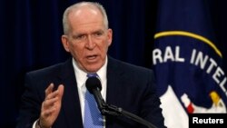John Brennan, Central Intelligence Agency director, speaks at a rare news conference at CIA headquarters in Virginia, Dec. 11, 2014. 